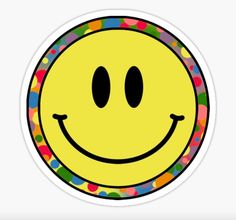 a smiley face sticker on a white background with multicolored confetti around it