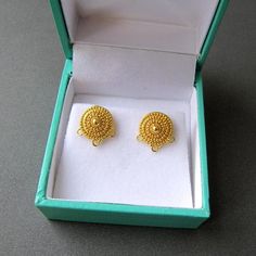 18k gold earring studs with backs - 1 pair10mm granulated circle3 closed rings at the bottomSolid 18 carat yellow gold Handmade granulatedBox not includedMatching bead:https://www.etsy.com/listing/643180029/18k-gold-coin-bead-solid-18-carat-yellow?ref=shop_home_active_86&pro=1 Traditional Gold Plated Round Clip-on Earrings, Gold Clip-on Earrings With Round Beads For Gift, Gold Hand-strung Round Beads, Elegant Red 14k Gold-filled Earrings, Gold Round Beads, Gems, And Cabochons For Gifts, Flower Ear, 18k Gold Earrings, Akoya Pearls, Silver Moon