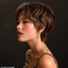 55 Charming Short Pixie Haircuts Short Feathered Pixie Haircut, Pixie Blonde Haircuts, Long Pixie With Highlights, Short Layered Haircuts Women, Pixie Hair Highlights, Pixie Haircut Highlights, Highlighted Pixie Cut, Pixie Cut Highlights