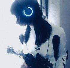 a woman with headphones holding a microphone