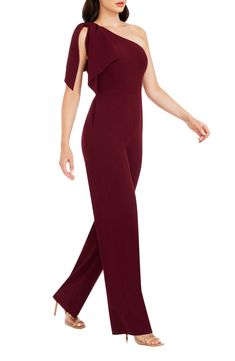 An elegant one-shoulder neckline and figure-skimming silhouette style a sophisticated jumpsuit with two panels that cascade over the single shoulder. 63 1/2" length; 34" inseam; 22 1/2" leg opening (size Medium) One-shoulder neck Sleeveless Lined 97% polyester, 3% spandex Dry clean Imported Elegant Solid Strapless Jumpsuit For Evening, Elegant One-shoulder Fitted Jumpsuit, Elegant Formal Asymmetrical Jumpsuits And Rompers, One-shoulder Jumpsuits And Rompers For Evening, Elegant Asymmetrical Evening Jumpsuits And Rompers, Elegant Evening Jumpsuit With Asymmetrical Shape, Elegant Asymmetrical Jumpsuits And Rompers For Work, Elegant Asymmetrical Evening Jumpsuit, Chic Formal Jumpsuits With Asymmetrical Neckline