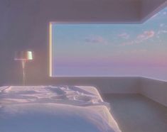 an empty bed in a room with a window looking out at the ocean and sky