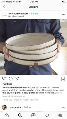 a man holding three plates on top of each other