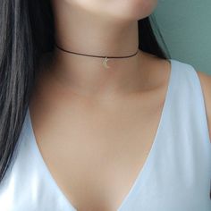 "Dainty moon Choker Necklace free to adjust size . A moon charm in our signature delicate cotton cord in minimal understated elegance. Elegant & Gorgeous. Can't go wrong with this beautiful piece! The moon is tiny and is a delicate touch to the necklace. Well executed elegance in a stylish, easy to wear necklace. The \"MOON CHOKER\" Necklace * SH30276 D E T A I L S: * Moon Dimensions: 4 x 7mm M A T E R I A L S: *Sterling Silver 925 / Gold Plated 18K. / Rose Gold Plated 18K. * Cotton cords of Minimalist Adjustable Choker, Adjustable Moon Charm Choker, Moon Phase Choker Necklace, Elegant Moon Charm Choker, Moon Charm Choker As Gift, Minimalist Choker Necklace With Adjustable Cord, Minimalist Adjustable Cord Choker Necklace, Minimalist Adjustable Moon Phase Necklace, Minimalist Adjustable Cord Choker