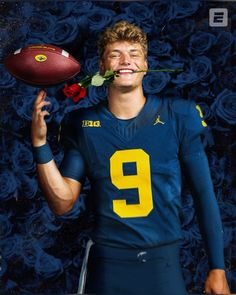 a football player holding a rose in front of his face