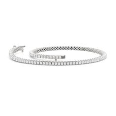 An alluring piece of jewelry to bring intrigue to your collection and to your accessorizing style. This tennis bracelet features a line of U-shaped metal baskets, each topped with a brilliant round diamond. The "scoop" setting maximizes the stone's sparkle and gives this classic line bracelet a more modern and playful style. Modern Flexible White Gold Diamond Bracelet, Modern Flexible Round Tennis Bracelet, Modern Flexible Tennis Bracelet, Modern White Gold Tennis Bracelet For Formal Occasions, Modern Flexible Round Diamond Bracelet, Modern Round Cut Tennis Bracelet, Playful Style, Metal Baskets, Gorgeous Engagement Ring