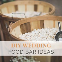 two wooden buckets filled with food sitting on top of a table next to each other