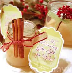 two jars filled with cinnamon sticks next to each other