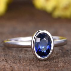 5x7mm Oval Cut natural Tanzanite engagement ring,plain wedding band,bridal ring,14k white gold promise ring,deco bezel ring,anniversary Solid 14k white/ rose/yellow gold width of band about 1.4mm Main Stone: Natural Tanzanite Carat Weight: 5x7mm Cut: Oval Cut Gem Weight: 1ctw Clarity: VS Setting Style: Bezel, Pave Other Features:Comfort Fit Jewelry maintenance tips ▶ To avoid of chemical reactions,do not touch with daily chemicals,such as soap,shower gel,shampoo,chemicals. ▶ To avoid deformation 14k White Gold Jewelry With Sapphire In Round Band, Timeless Jewelry With Lab-created Sapphire For Gift, Timeless Lab-created Sapphire Jewelry Gift, Dainty Sapphire Jewelry For Formal Occasions, Formal Dainty Sapphire Jewelry, Timeless Lab-created Sapphire Promise Ring, Classic Tanzanite Jewelry For Promise, 14k White Gold Solitaire Jewelry, Elegant Tanzanite Promise Jewelry