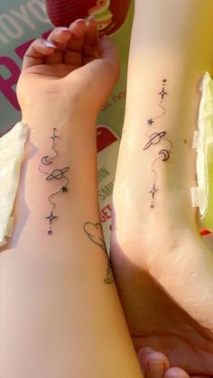 two people with matching tattoos on their legs