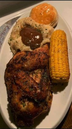 grilled chicken, corn on the cob and mashed potatoes