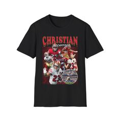 This is an original design made by TynitCO! Vintage styled, Christian Mccaffrey throwback shirt. Crafted from ultra-soft materials, this tee offers an easygoing feel you'll love. In solid colors, it's pure cotton, while heather and sports grey options include polyester. Designed for durability, the shoulders feature twill tape. The absence of side seams adds to its clean look and comfy fit. The ribbed collar prevents curling. Specifications: *Material: Varies by color, 100% ring-spun cotton for solid colors. *Fabric: Lightweight and comfy for all-day wear. *Fit: Eurofit gives a modern look. *Label: Tear-away for convenience. *Sizing: True to size for an effortless fit. Shipping: It normally takes 1-3 business days to process an order and then delivery is another 3-5 days with standard ship Vintage Graphic T-shirt For Football Season, Vintage Graphic Print T-shirt For Football Season, Vintage Graphic Print Football T-shirt, Football Season Streetwear T-shirt With Screen Print, Graphic Tee T-shirt With Custom Print For Fans, 90s Style Short Sleeve T-shirt For Game Day, 90s Graphic Print T-shirt For Fan Gear, 90s Style Graphic Print T-shirt For Fans, Football Season Short Sleeve With Graphic Print