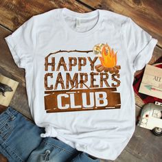 a t - shirt with the words happy campers club on it and a fire