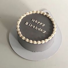 a birthday cake with the words happy birthday written on it