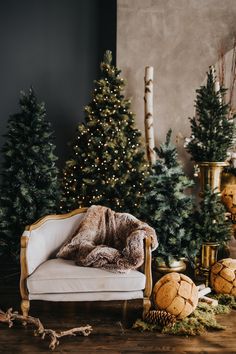 a living room filled with christmas trees and furniture