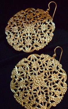 In search of big gold earrings...$25 etsy Handmade Gold Ornate Chandelier Earrings, Ornate Round Chandelier Earrings With Intricate Design, Gold Ornate Chandelier Earrings With Intricate Design, Ornate Gold Chandelier Earrings For Festivals, Gold Ornate Chandelier Earrings For Festivals, Ornate Gold Filigree Earrings, Ornate Gold Brass Chandelier Earrings, Gold Filigree Earrings For Party, Gold Round Earrings With Intricate Design