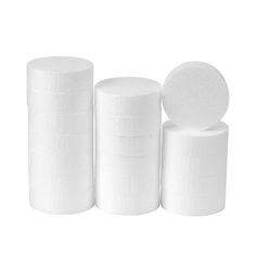 three rolls of white toilet paper stacked on top of each other in front of a white background