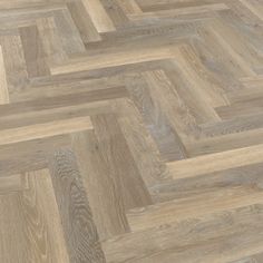 an image of wood flooring that looks like herringbones