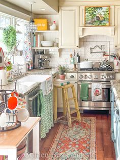 a kitchen filled with lots of furniture and decor