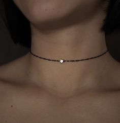 Queen of December. Inspired by the magic of winter skies. Composed of tiny gold electroplated hematite star, black rhodium over 925 sterling silver delicate chain and components. Such a delicate and sparkling piece with a unique dark vibe . The tiny stars sparkle in silver and blue tones. You can choose between 3 chain lengths: 12 / 13 / 14 inches Not sure which length to buy? We can add a 1 inch extender chain. Just write a note at checkout! ❈ We send all our items with registered mail. ❉ Due to the organic nature of stones, there might be a slight variation in colour, size and shape. ✺ All items come packaged in a quality velvet pouch ready for gift giving. ✽ If you want to make a special order, just contact us! Edgy Star-shaped Jewelry With Star Charm, Black Adjustable Necklace With Star Charm, Adjustable Black Necklace With Star Charm, Black Star Charm Choker Jewelry, Black Star Charm Jewelry, Edgy Star Charm Jewelry As A Gift, Edgy Adjustable Star-shaped Jewelry, Adjustable Edgy Star Jewelry, Adjustable Star-shaped Edgy Jewelry