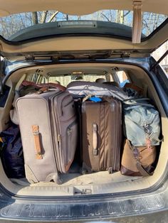 the trunk of a car filled with luggage