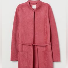 This H&M Pink Faux Suede Coat Is Gorgeous! Nwot, Still Has Plastic Loop Holding The Belt To The Coat Size 2 Color Is Called Raspberry Red. It Was A Limited Edition Item & No Longer In Stores. Stock Photos Are The True Color. For Some Reason, My Camera Makes It Look Red, But It Is Not, It's Pink. Straight-Cut Coat In Soft Faux Suede With No Fasteners Small Stand-Up Collar, Removable Tie Belt At Waist, And Patch Front Pockets Unlined 90% Polyester, 10% Elastane Ptp 19" Length 33" Elegant H&m Fall Outerwear, Elegant H&m Outerwear For Fall, H&m Pink Spring Outerwear, Pink H&m Outerwear For Spring, H&m Pink Outerwear For Spring, Pink H&m Outerwear For Fall, H&m Pink Outerwear For Fall, Long Suede Coat, Iranian Women Fashion