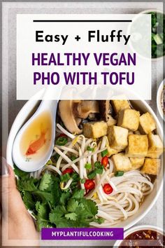 healthy vegan pho with tofu in a white bowl on top of a table