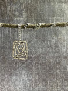 This beautiful silver boho pendant / charm necklace features a unique and light weight silver plated pendant that gently hangs from an 20" long 2 mm wide stainless steel chain finished with a lobster clasp.  You'll love this simple lead-free, nickel-free and cadmium-free chain.  So versatile, this necklace will go perfectly with everything in your closet, or make the perfect, thoughtful gift! Looking for a set? Find the matching earrings here! https://www.etsy.com/listing/1271604102 Silver Boho Silver Boho Necklace, Square Pendant Necklace, Boho Pendant, Square Pendant, Geometric Necklace, Hammered Silver, Bohemian Jewelry, Boho Necklace, Steel Chain