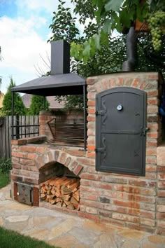 an outdoor brick pizza oven in the backyard