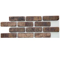 an old brick wall is shown with white background and brown bricks on the bottom half