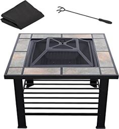 an outdoor fire pit with grill and accessories