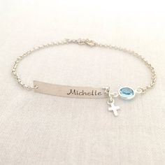 Hand Stamped Baby Boy Baptism Bracelet, Cross Jewelry, First Communion Gift, Baby Girl Bracelet, Christening Gift, Gift for Godchild♥ Now is available in 14K Rose Gold Filled♥ Available in Sterling Silver and 14K Gold Filled♥ Please be sure to drop a name and month of birthstone in the note box at checkout.♥ Specification. All component is Sterling Silver or 14K Gold Filled. Bar size 5 x 30mm. Cross size 4.4 x 7.2mm. Birthstone size 7mm. Thicker Rolo Chain. Comes in a satin pouch. Length include Personalized Cross Rosary Bracelet For Baptism, Personalized Silver Name Bracelet For Baptism, Adjustable Silver Name Bracelet For Baptism, Silver Name Jewelry For Baptism, Custom Name Silver Jewelry For Baptism, Boy Bracelet, Baptism Bracelet, Boys Bracelets