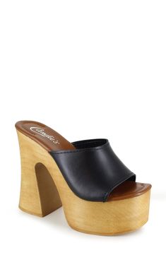 A woodgrain platform and soaring block heel lend scene-stealing height and retro-cool appeal to a slide sandal that will elevate your trendsetting looks. 4" heel; 2" platform Leather upper and lining/synthetic sole Made in Spain Platform Slides, Fabric Gift Bags, Nordstrom Store, Anniversary Sale, Sandal Women, Slide Sandals, Block Heels, Womens Sandals, Leather Upper