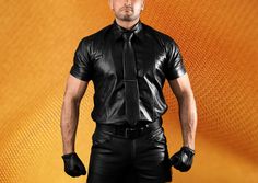 💡 𝐏𝐑𝐎𝐃𝐔𝐂𝐓 𝐈𝐍𝐅𝐎𝐑𝐌𝐀𝐓𝐈𝐎𝐍: Handmade Genuine Black Leather T-Shirt. It's beautifully hand made from high quality Sheep Leather for a stylish look, last to use. Quality and Durability is Guaranteed. WE DELIVER WHAT WE SHOW! 💥 𝐅𝐄𝐀𝐓𝐔𝐑𝐄𝐒: 💠 Made With 100% Genuine Sheep Leather. 💠 Front Snap Buttons Closure. 💠 Double Stitched for Extra Durability. 💠 Fully Lined with Cool Comfortable Satin finish Material. 💠 Wear this Leather Shirt with black leather Pant. The Pant is also listed in Our Store. 💠 Available in Many Colours.✔️ 💠 Hassle-Free Return Policy.✔️ ✂️ 𝐒𝐈𝐙𝐈𝐍𝐆 𝐈𝐍𝐅𝐎𝐑𝐌𝐀𝐓𝐈𝐎𝐍: Kindly measure yourself with a tape, we need your actual measurements without any additions because We'll be adding a few inches to them during production to leave sufficient Mens Leather Shirt, Leather T Shirt, Biker T Shirts, Black Leather Pants, Leather Pant, Uniform Fashion, Leather Shirt, Sheep Leather, Black Sheep