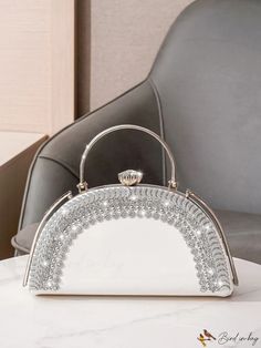 BirdinBag - Elegant Rhinestone-Embellished Ladies Evening Bag, Perfect for Parties Elegant Crystal Bags With Rhinestones, Silver Top Handle Bag For Wedding, Silver Bags With Detachable Handle For Events, Silver Event Bag With Detachable Handle, Silver Event Bags With Detachable Handle, Silver Crystal Clutch Bag, Silver Handheld Bag With Bling, Crystal Clutch Bag With Rhinestones, Silver Rhinestone Bags For Events