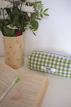 Quilted olive gingham pencil case with ivory lining and a white zip.  Perfect for gifting for students  Handmade in the UK 📏 Measurements  22cm x 7cm x 7cm  size may vary slightly as everything is handmade by me :) 🧺 Materials  Exterior 100% cotton Interior 100% cotton Padding 100% polyester Nylon zip 🧼 Care Instructions Do not machine wash, gently hand wash and air dry. Do not iron.  📦 Shipping Please allow up to one week for your order to be shipped as I have to sew each individual order :) Feel free to message me any questions  Other colours and patterns available at:  To view all products go to: https://www.etsy.com/uk/shop/DaisyHandmadeShopUK?ref=simple-shop-header-name&listing_id=1415842980 Rectangular Green Pencil Case, Quilted Pencil Case, Aesthetic Pencil Pouch, Pencil Pouch Aesthetic, Pencil Case Aesthetic, Pencil Case Pattern, Pink Pouch, Pouch Handmade, Fabric Combinations