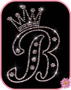 the monogrammed letter b is made up of swaroons and sparkles