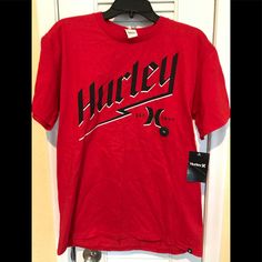 Hurley T-Shirt New Never Worn Red Screen Print Shirt For Spring, University Red Crew Neck T-shirt For Summer, Red Shirt For Spring Streetwear, Red Streetwear Shirt For Spring, University Red Cotton T-shirt For Summer, University Red Graphic Tee With Short Sleeves, Sporty Red T-shirt For Summer, Red Short Sleeve T-shirt For Spring, Spring Red T-shirt With Logo Print