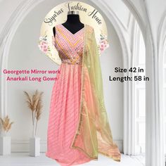 Glamorous Georgette Mirror Work Anarkali Long Gown ✨💖 Elegant and Festive 💖* Size: 42 in* Length: 58 inPerfect for Special Occasions Mirror Work Anarkali, Long Gown Elegant, Partywear Gowns, Georgette Anarkali, Gown Elegant, Lehenga Gown, Hand Work Blouse, Ready To Wear Saree, Chaniya Choli