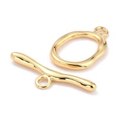 Toggle Clasp 18k Real Gold Plated, Large Toggle Clasp, DIY Jewelry Making Supplies  This large oval shiny gold toggle is made out of solid brass and it is electroplated with real 18k gold. This Toggle clasp matches all the 18k shiny gold plated chains that we carry.  18k Gold Plated Oval Toggle Finish: Shiny Gold Size: About  Ring: 24x15x2.5mm, Hole: 2.5mm, Bar: 29x9.5x2.5mm, Hole: 2.5mm Base: Solid Brass 1 Toggle set The photo of the necklace is for demonstration purpose only and its NOT includ Gold Link Chain, Custom Charms, Twist Ring, Toggle Clasp, Gold Plated Chains, Diy Jewelry Making, Jewelry Making Supplies, Real Gold, Boho Jewelry