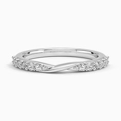 a white gold wedding band with diamonds