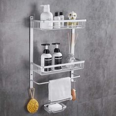 a bathroom shelf with two shelves holding soap and lotion