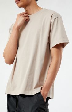 Step into classic style with the Tan Premium T-Shirt. This sleek tee features a solid color design, crew neckline, short sleeves, and a relaxed fit for a timeless look. Crafted from a soft and comfortable fabrication, it's the perfect addition to your wardrobe for effortless and versatile casual wear.


	Crew neckline
	Short sleeves
	Relaxed fit
	Solid color tee
	50% Cotton, 50% polyester
	Machine washable
	Model is wearing size medium
	Model Measurements: 6'2” Height, 28" Waist, 32&r Oversized T Shirt, Personal Marketing, Shirt Price, Model Measurements, Pacsun, Crew Neckline, Cool Style, Classic Style, Casual Wear