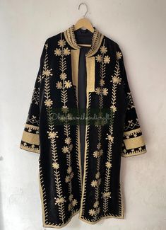 Hand-Embroidered Cotton Velvet Long Coat, Suzani Fabric Unisex Jacket, Kimono Style Coat, Party Wear Jacket, Overcoat, Velvet Fabric Coat, Please MESSAGE us for CUSTOM ORDERS  Product: 100% Cotton Velvet Embroidery Long Jacket Coat Measurements :   Length- 46 Inches /116 CM   Bust-50 inches / 127 CM   Sleeve-24 inches / 60 CM Size: Free Size Robe ( S to XXL )  Cotton kimono robes are perfect for lounging around the home or spa. Versatile, soft and luxurious. Add a luxe, boho feel to your bridal Fall Festive Outerwear With Gold Embroidery, Festive Fall Outerwear With Gold Embroidery, Festive Embroidered Long Coat Outerwear, Embroidered Long Coat For Festive Occasions, Festive Embroidered Long Coat, Long Winter Outerwear With Chikankari Embroidery, Fitted Winter Outerwear With Dabka Work, Winter Outerwear With Gold Embroidery And Long Sleeves, Traditional Black Festive Outerwear