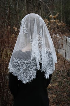 This is SOFT! In lovely soft, white floral lace, this small, rectangular chapel veil is soft and lightweight. A sewn in clip holds it in place. It comes with our free veil storage bag! Please convo us with any questions or special requests! Blessings! Our veils are custom made for you! Please see the Shipping & Returns section for our current processing times. Prefer a sewn-in clip? See listing details to see if one is included with your veil. If not, you may request one -if desired- in a no Lace Veil With Lace Trim For Ceremonies, Lace Ceremony Veil With Lace Trim, Ceremony Lace Veil With Lace Trim, Ceremony Veil With Lace Trim, White Fitted Lace Veil, Lace Wedding Veil With Lace Trim, Church Lace Veil With Lace Work, White Lace Trim Veil For Ceremony, White Delicate Lace Veil For Ceremony