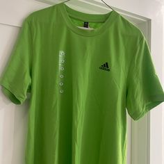 Bright Green With Subtle White Line Throughout Regular Fit Axis Tee 2.0 Pit To Pit Is Approximately 22” Green Casual Moisture-wicking Shirt, Casual Green Moisture-wicking Shirt, Green Casual Shirt With Moisture-wicking, Adidas Green Sports T-shirt, Adidas Green T-shirt For Sports, Casual Green Adidas T-shirt, Casual Green Adidas Tops, Green Adidas Crew Neck T-shirt, Adidas Green Crew Neck T-shirt