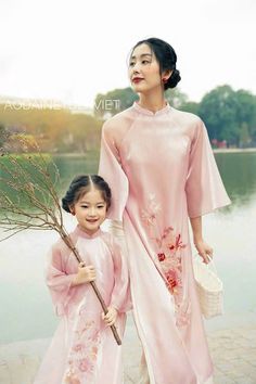 "🌿 This set includes traditional Ao Dai, pants For Girls Style: Traditional Material: Very well made with high-quality silk Collar: 1cm collar Please provide bust-waist-and hip measurements when placing your order to ensure the best fit for you. 🌿 NOTE: * Recommend gentle washing * Please contact us for any inquiries about size. We don't have an exchange policy for the wrong size * It is safe for a washer and dryer in a \"delicate\" setting. * Actual Ao Dai colors may differ up to 10% due to l Elegant Sets For Traditional Ceremonies In Spring, Traditional Summer Festive Ao Dai, Spring Long Sleeve Sets For Traditional Ceremonies, Traditional Pink Ao Dai For Spring, Embroidered Sets For Spring Traditional Ceremonies, Traditional Ao Dai For Spring Festivals, Traditional Ao Dai For Spring Festive Occasions, Pink Long Sleeve Sets For Traditional Ceremonies, Traditional Spring Ao Dai For Festive Occasions