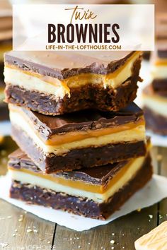 chocolate and peanut butter brownies stacked on top of each other with the words, twix brownies life - in - the - the - lofthouse com