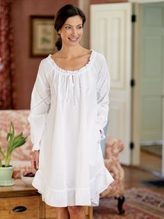 There's something romantic about clothing worn during the Renaissance. . . those soft, billowy sleeves; loose, comfortable necklines, and pretty details. Our Poet's Nightshirt takes its inspiration from the Renaissance with its gathered neckline with tie, lace insets, relaxed sleeves with embroidery and pearlized bead detailing, and shirttail hem with ruffle. Soft billowy sleeves and loose comfortable neckline Finished with a ruffled shirttail hem Approx. 40" long 100% cotton Machine wash and dr Womens Sleepwear, Poet Shirt, Sleepwear For Women, Vermont Country Store, Eileen West, Cotton Nightgown, Country Store, Medieval Fashion, Lace Inset