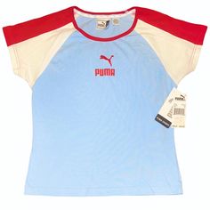 New Puma Light Blue Logo Shirt Size Girls Xl (Will Also Be Perfect For A Woman’s Size Small Medium Or Large Depending On The Desired Look) ~ Personally I Believe It Will Fit Perfectly On A Woman’s Size Medium ~ New With Tags Puma Girls Blue Red White Logo Athletic Short Sleeve Tee Shirt Top Puma Kids Light Blue Logo Shirt New With Tags Light Blue Puma Logo Shirt Approx Measurements When Laid Flat: Shoulder To Hem 22 Inches Armpit To Armpit 18 Inches Neck To Hem 18.5 Inches #Puma #Pumashirt Red Sports T-shirt For Spring, Sporty Cotton Tops For Playwear, Casual Blue Color Block T-shirt, Light Blue Cotton Sports Top, Spring Blue Color Block T-shirt, Sporty Graphic Print Tops For Playwear, Sporty Tops With Graphic Print For Play, Casual Blue Sports Shirt, Casual Sports Shirt For Spring